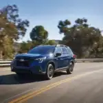 Blue 2026 Subaru Forester driving on the road