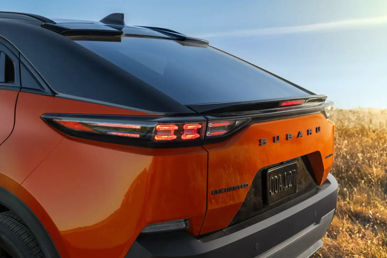 Orange Subaru Uncharted rear hatch view