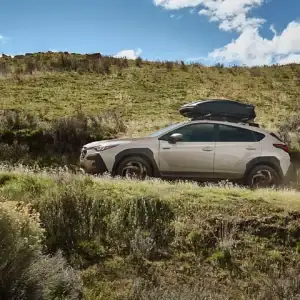 2026 Subaru Crosstrek Hybrid Driver's Side View on the Road