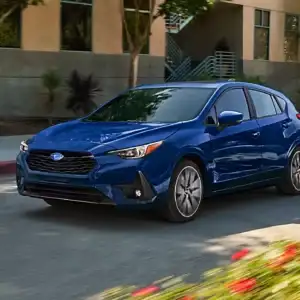 2026 Subaru Impreza Sport Sapphire Blue Pearl in a city