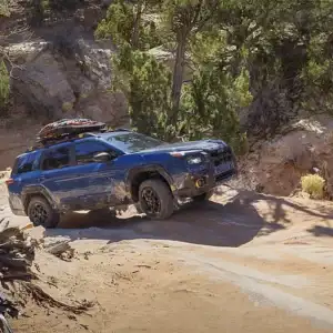 2026 Subaru Outback Wilderness Geyser Blue on sand