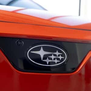 2026 Subaru Uncharted Habanero Orange Metallic emblem