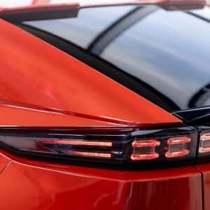 2026 Subaru Uncharted Habanero Orange Metallic driver side rear