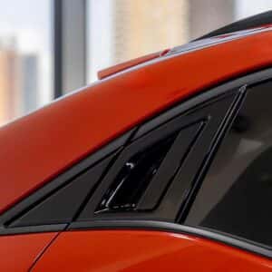 2026 Subaru Uncharted Habanero Orange Metallic rear quarter window