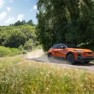 2026 Subaru Uncharted Habanero Orange Metallic in motion