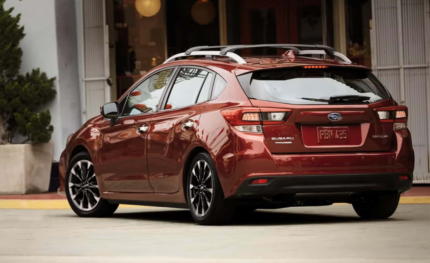 The Fresh And Budget Friendly 2023 Subaru Impreza, Parked On A City Street