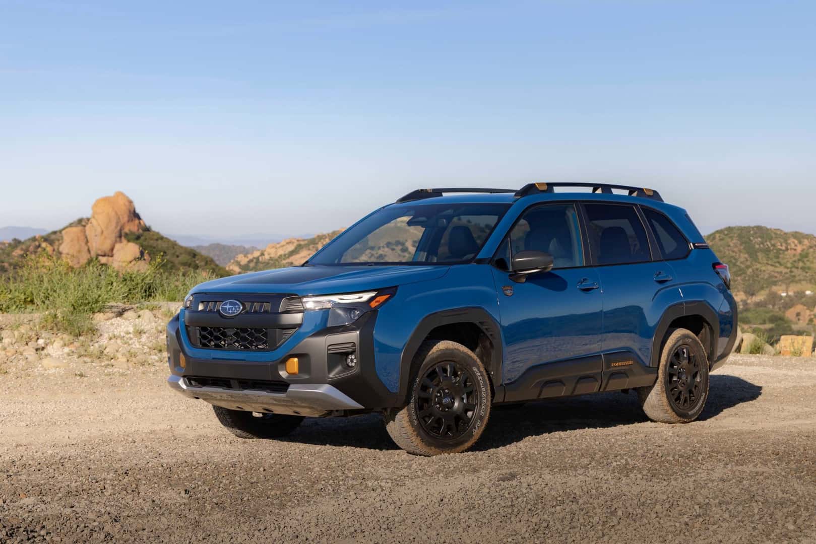 The Fuel Efficient 2027 Subaru Forester Wilderness Hybrid, Magnificently Parked In Front Of Nature That Goes To The Horizons