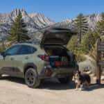 2026 Subaru Crosstrek at a Carson Range trailhead near Carson City, Nevada, rear hatch open with trail gear loaded
