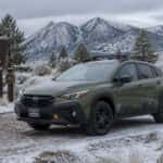 2026 Subaru Crosstrek at snowy Carson City area trailhead in winter with Sierra Nevada peaks in background