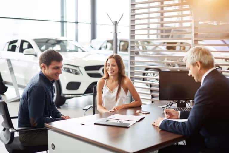 couple-working-with-finance-specialist-mobile