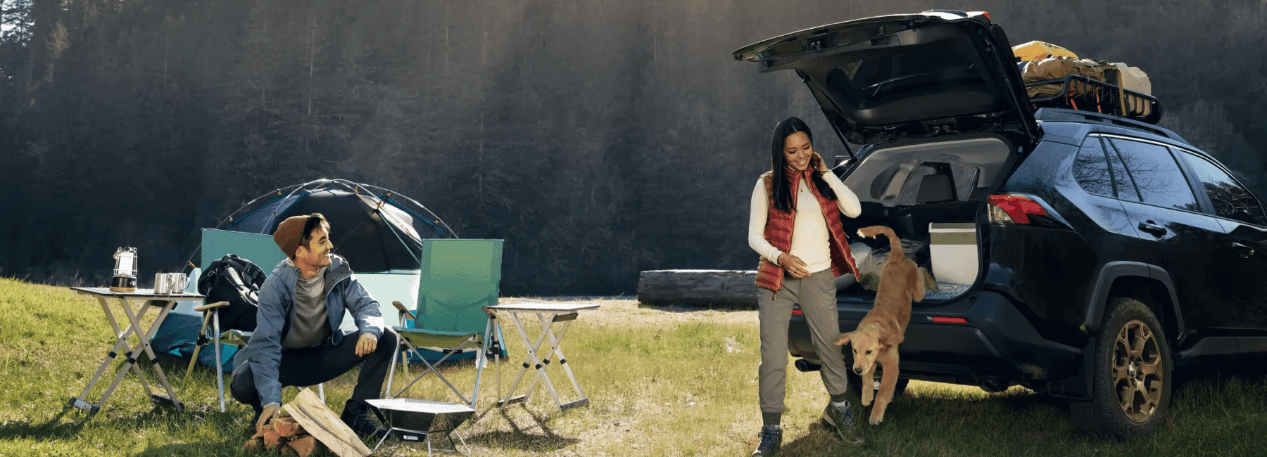 2023-RAV4-parked-while-couple-camps-nearby.