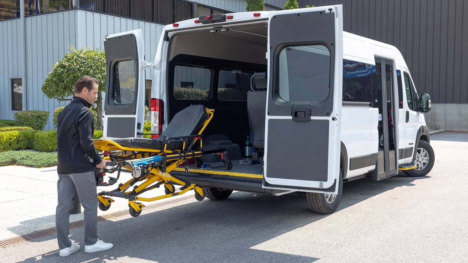 man loading accessible van