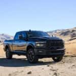 2026-RAM-Heavy-Duty-black-truck-in-field