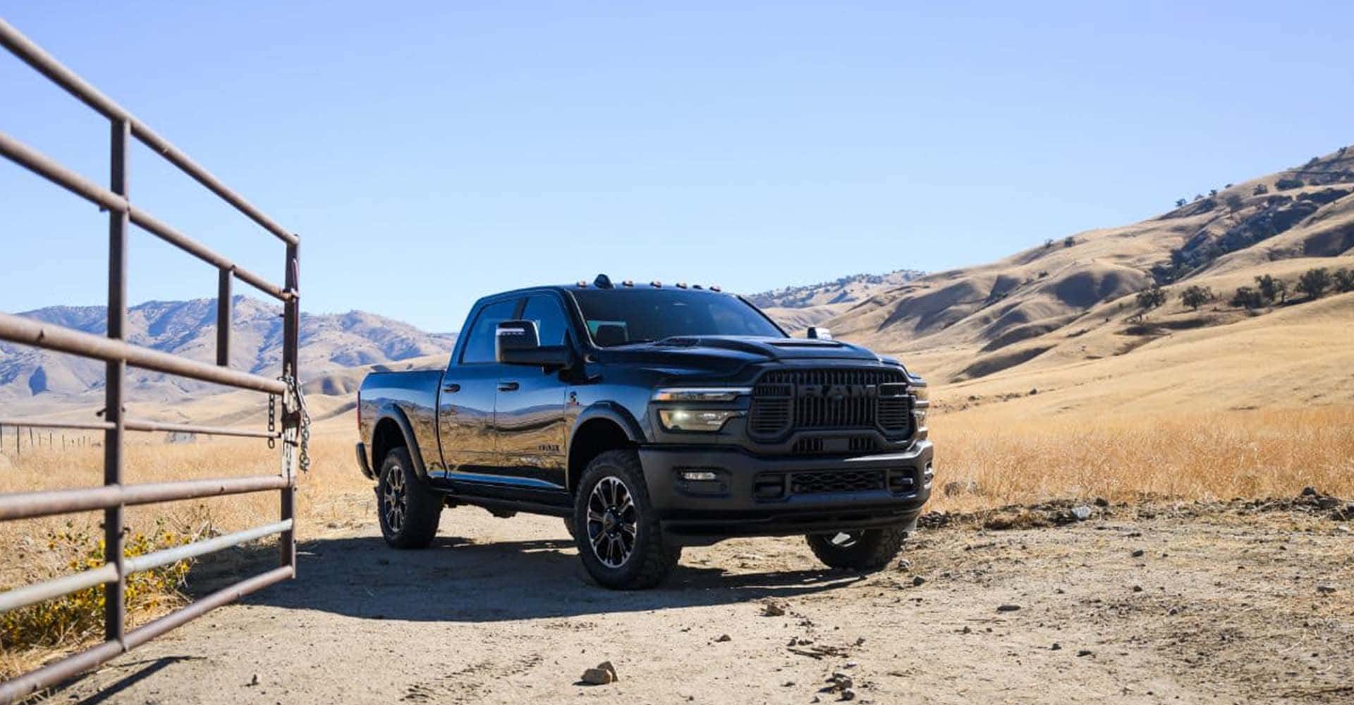 2026-RAM-Heavy-Duty-black-truck-in-field