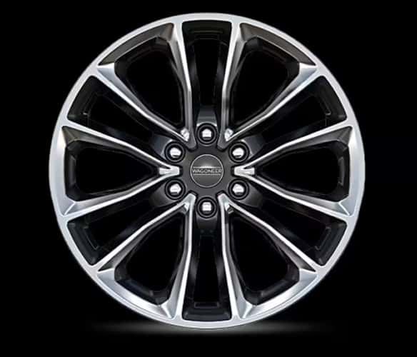 22-Inch Polished Aluminum Wheels with Black Noise Pockets