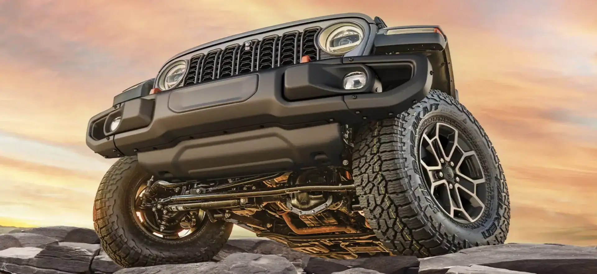 The 2026 Jeep Wrangler in a rocky terrain