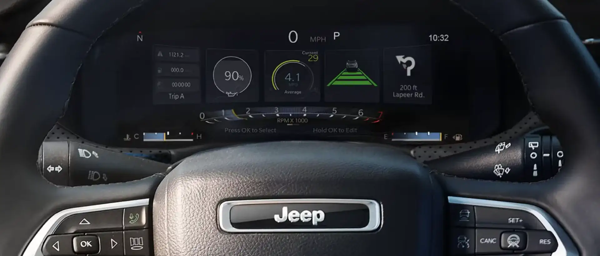 2026 Jeep Compass digital driver display showing speed, fuel economy, lane assist, and navigation