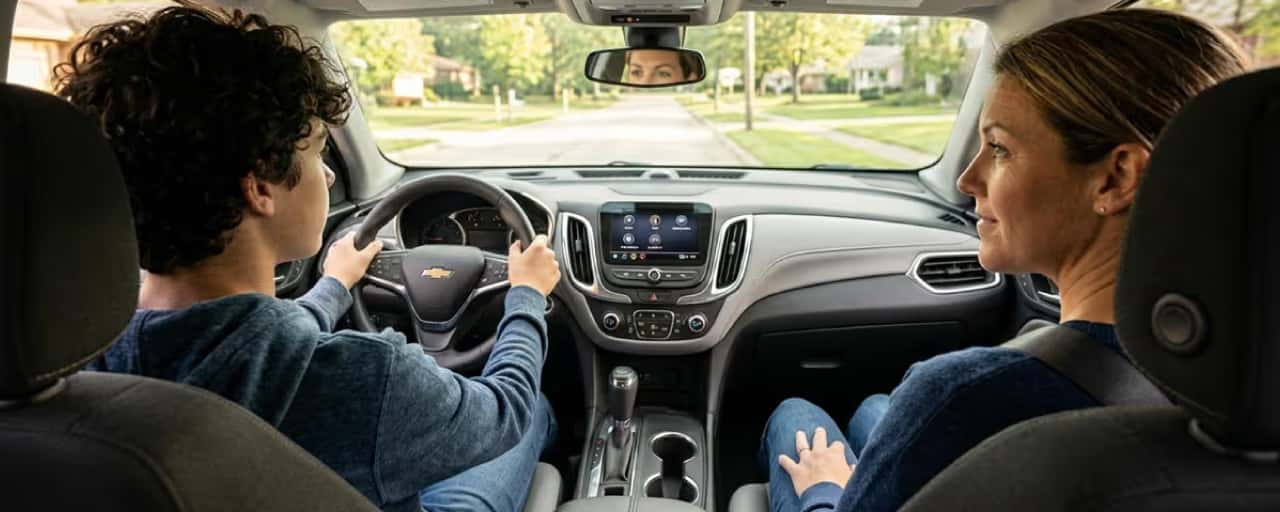 2026 Chevy Trax and Chevy Equinox parked side by side, teen driver friendly SUVs at Napleton Palatine Chevrolet