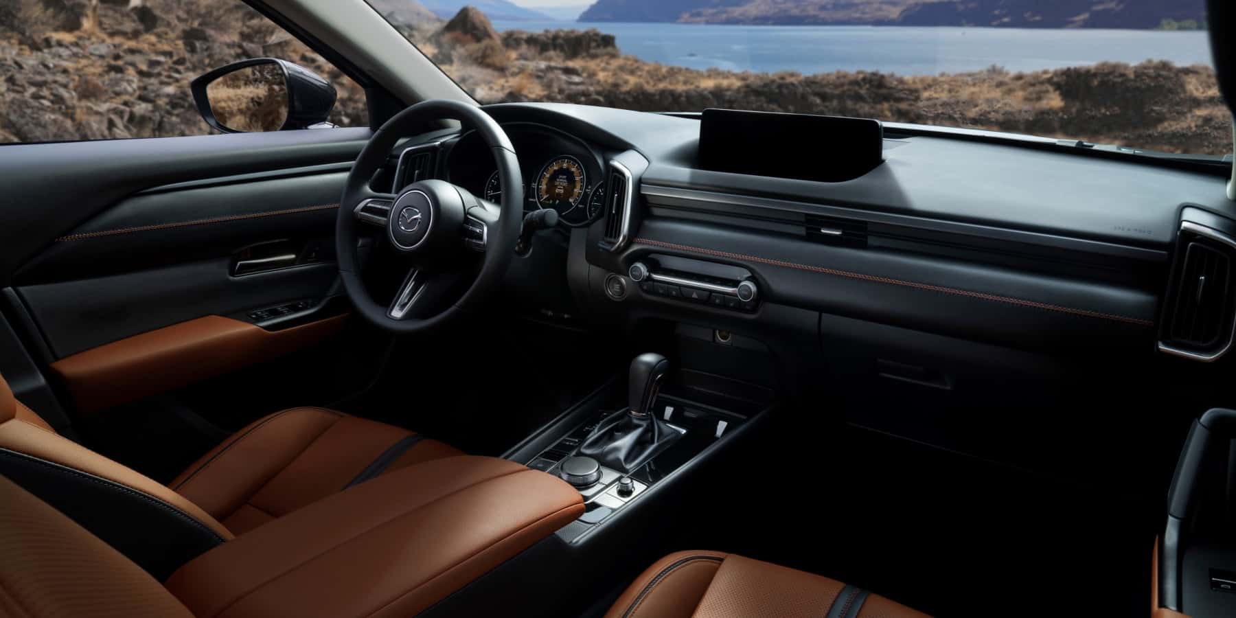 2026 Mazda CX-50 exterior showcasing Kodo design and available powertrain options