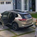 2026 Nissan Rogue parked at a Vero Beach home showing family friendly design