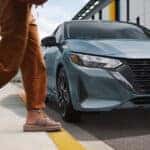 Nissan vehicle prepared for tire rotation service in Vero Beach FL