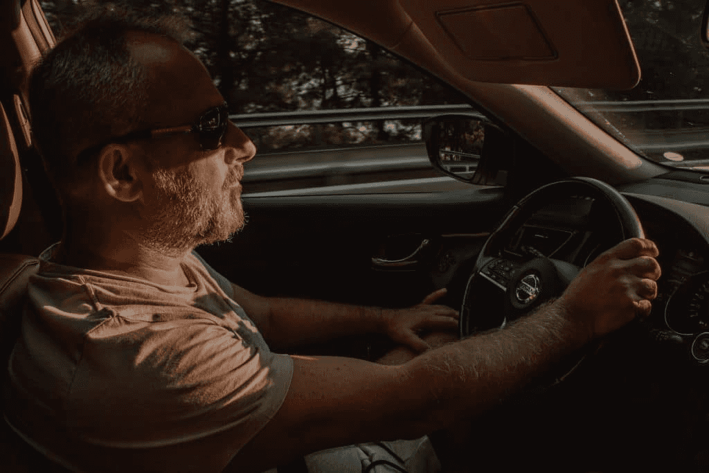 Man Driving a Car