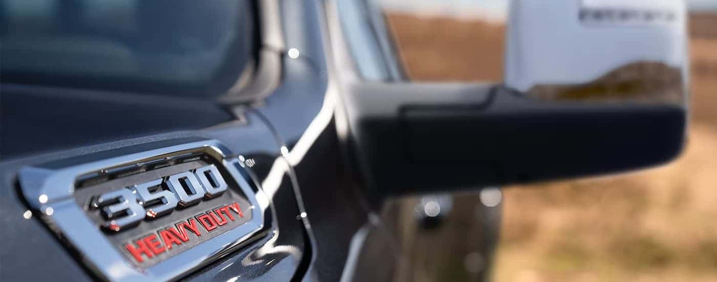 The hood on a black 2025 Ram 3500.