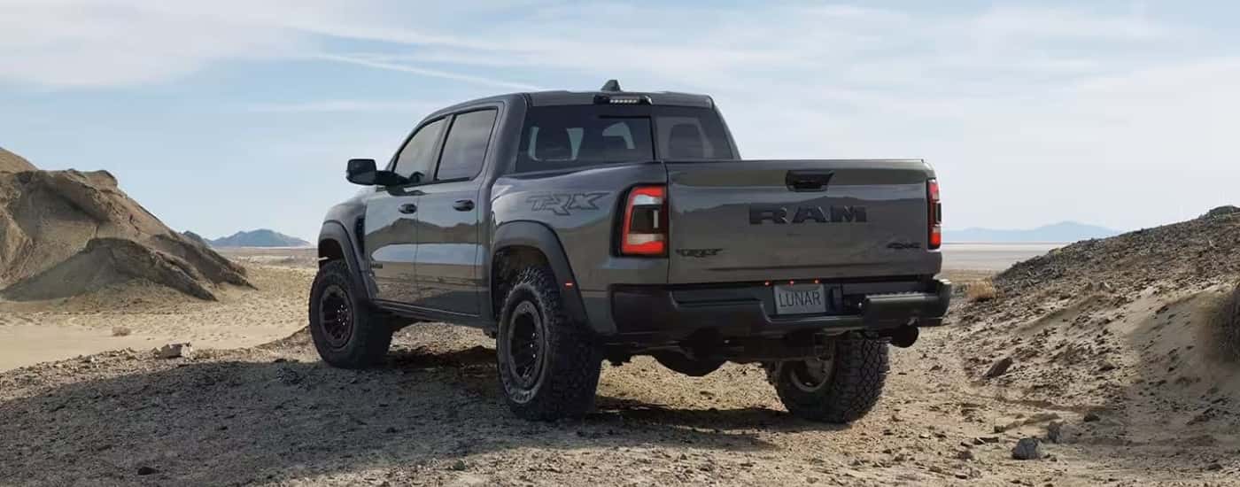 A grey 2023 Ram 1500 TRX Lunar Edition parked off-road.