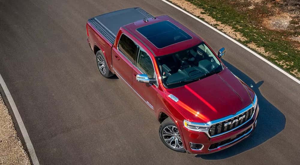 An aerial view of a red 2025 Ram 1500 after visiting a Ram dealer.