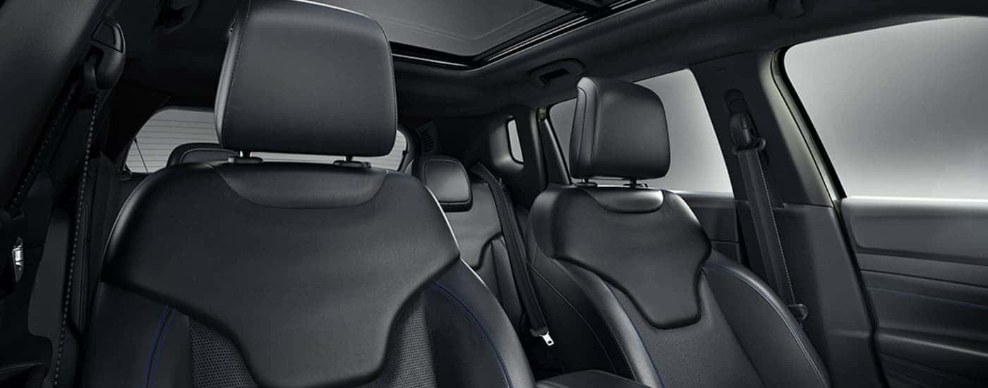 Black leather interior of a 2025 Jeep Compass at a Jeep Dealer Near San Antonio