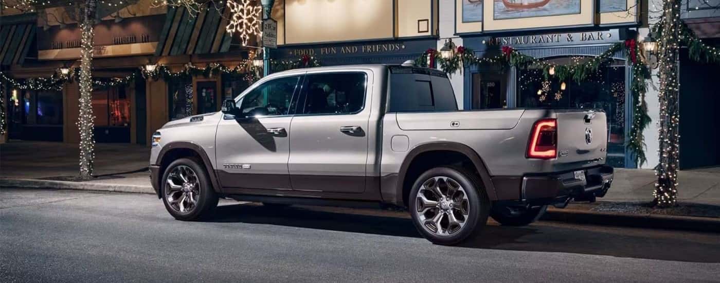 Grey 2020 Ram 1500 parked by a city curb.