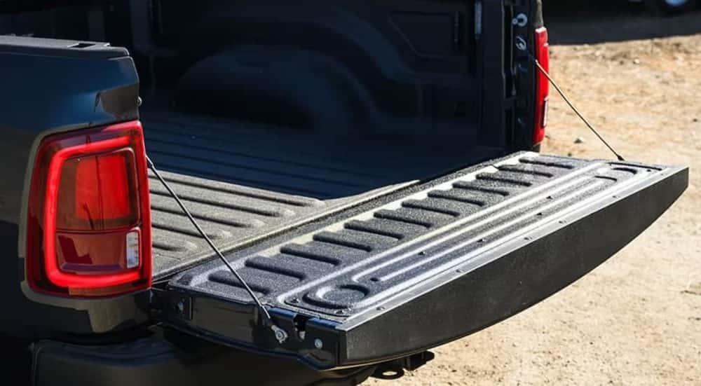 The open tailgate on a black 2026 Ram 2500.
