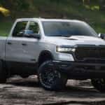 White 2026 Ram 1500 parked off-road.