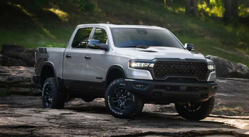 White 2026 Ram 1500 parked off-road.