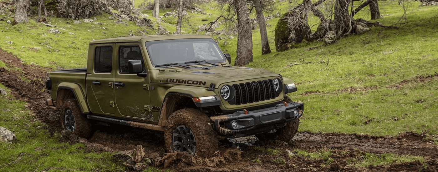 Green 2026 Jeep Gladiator mudding