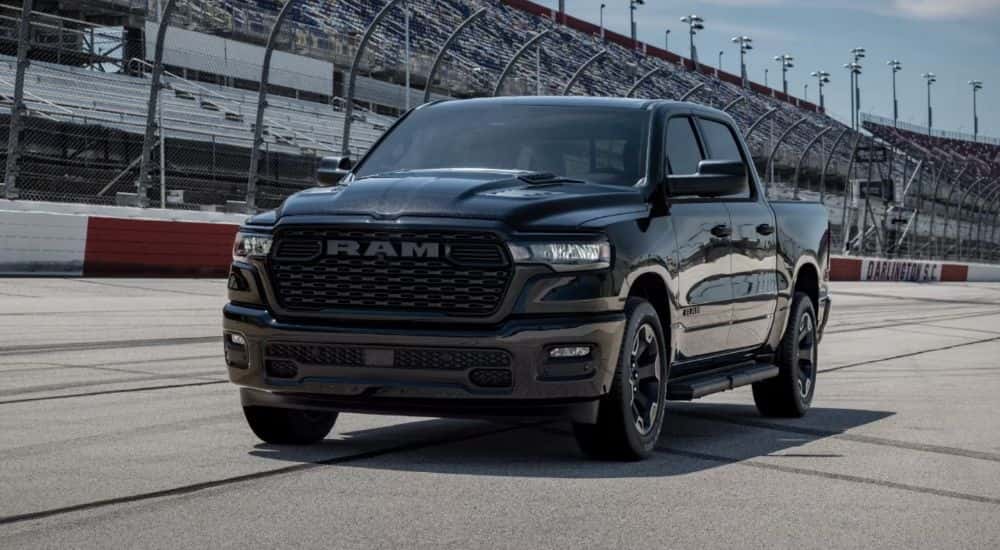 Black 2026 RAM 1500 Black Express edition on a racetrack