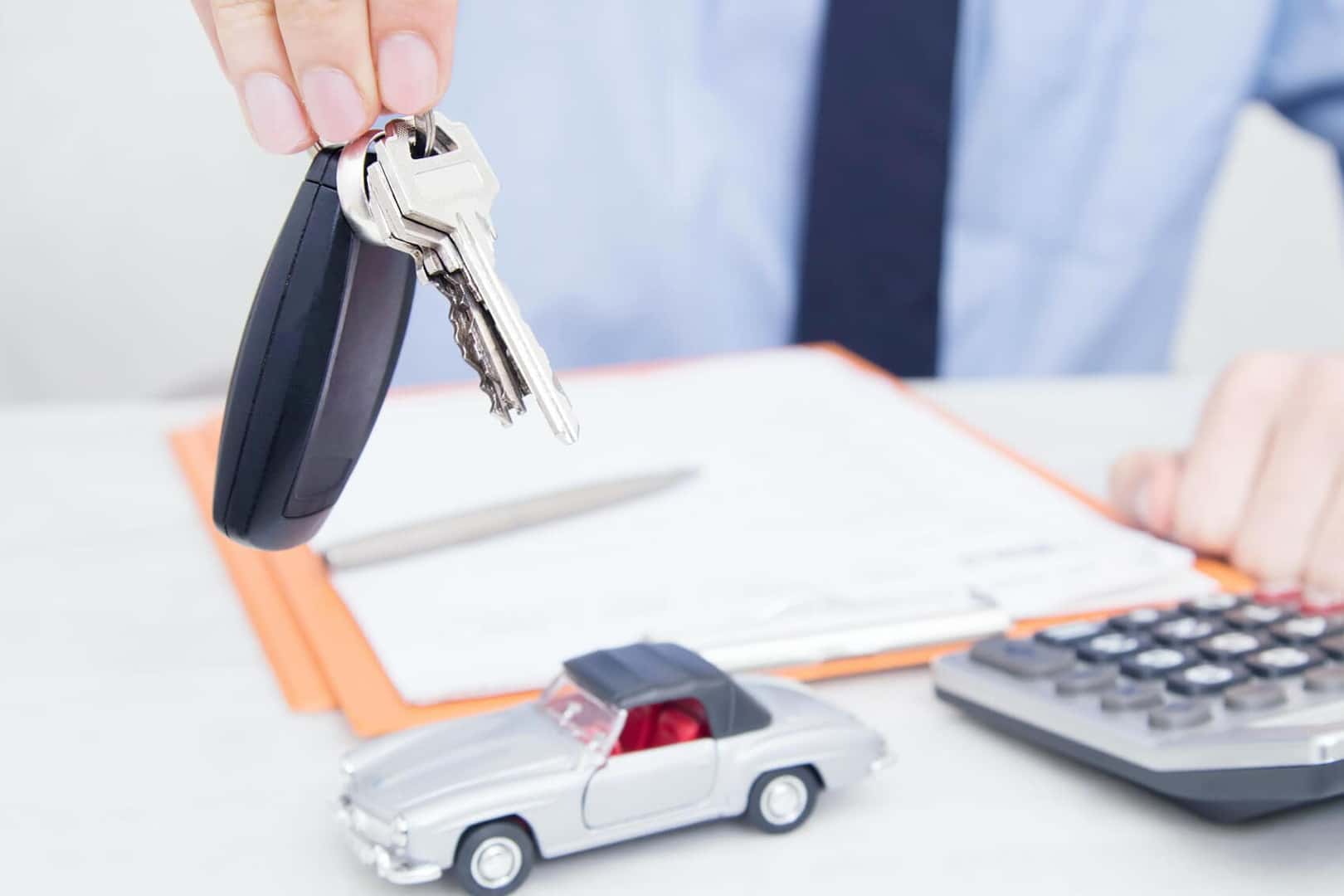 Finance Sales Man Holding Car Keys