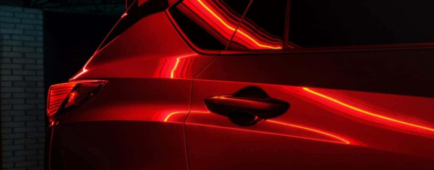 Exterior details on a red 2025 Acura RDX