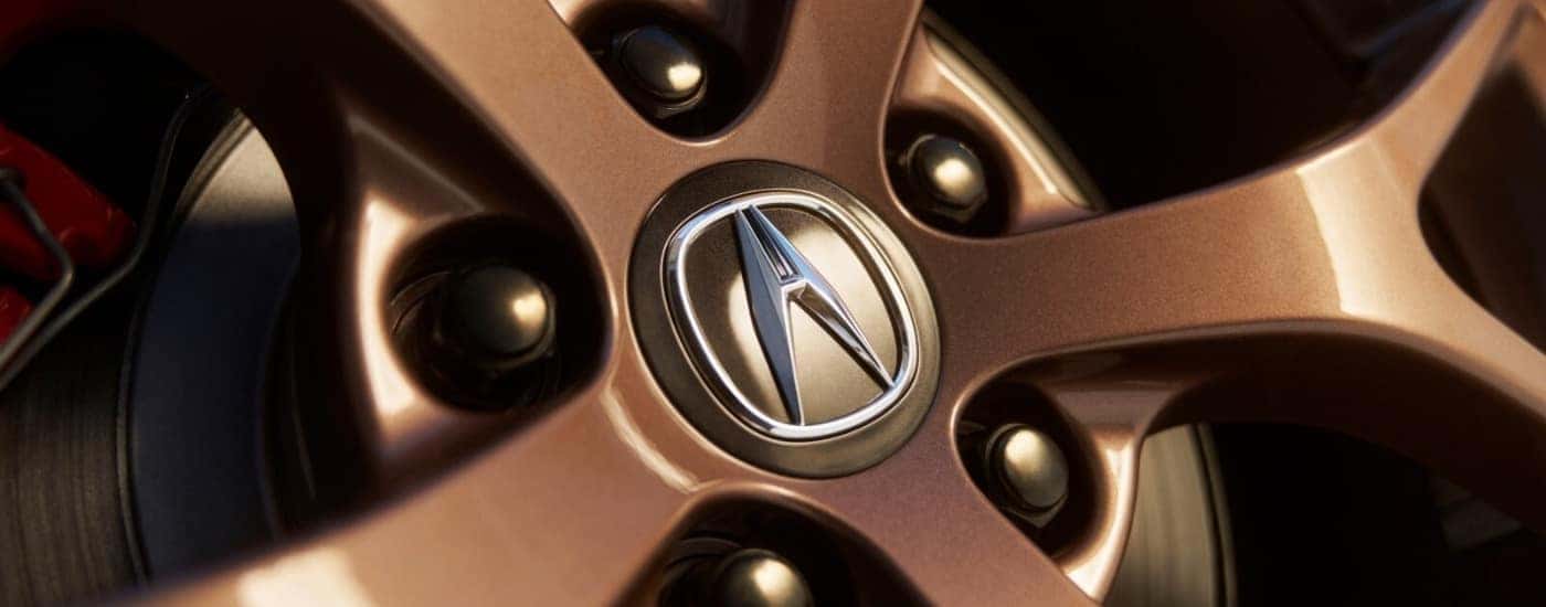 Center cap on a bronze wheel of a 2025 Acura TLX