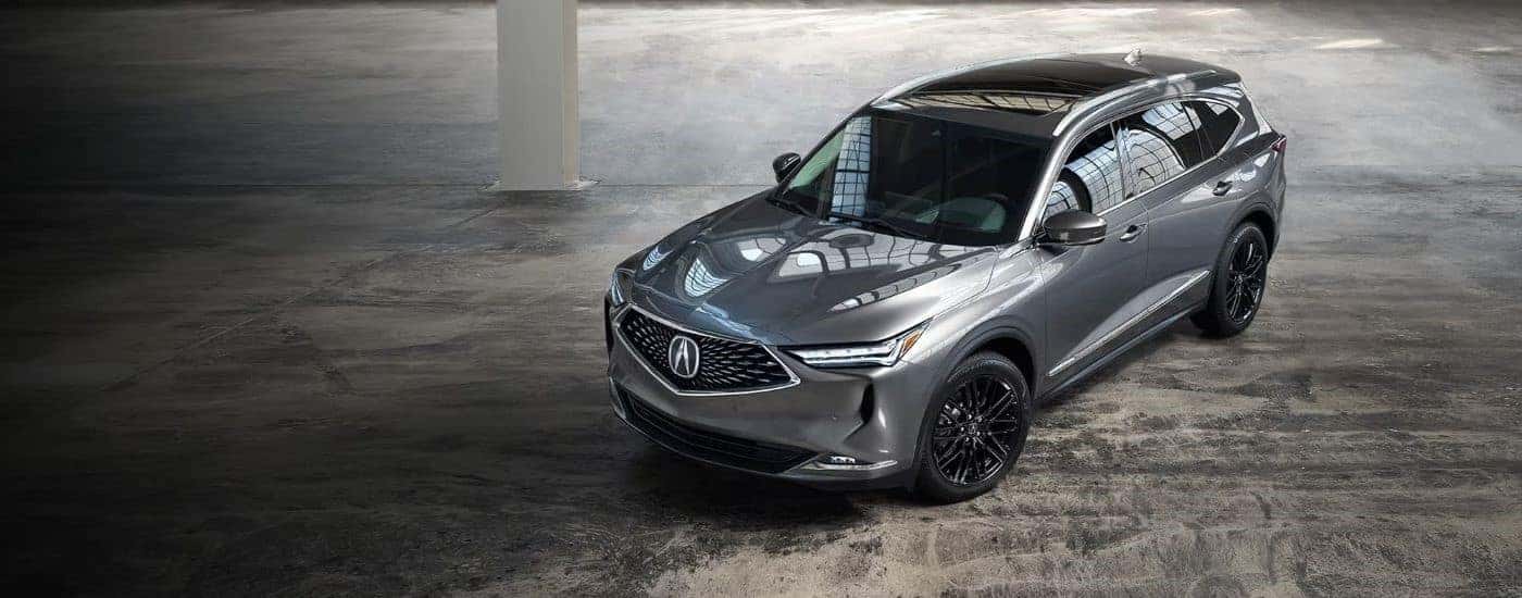 Silver 2023 Acura MDX parked at an angle