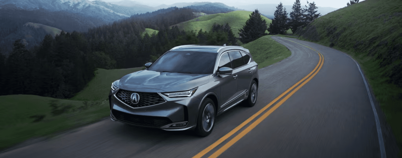 Silver 2026 Acura MDX for sale on a test drive