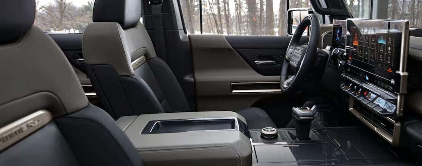 The black and gray interior in a 2025 GMC Hummer EV.