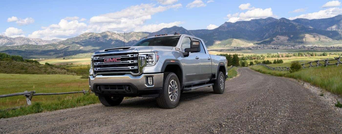 A silver 2023 GMC Sierra 2500 for sale near me is parked.