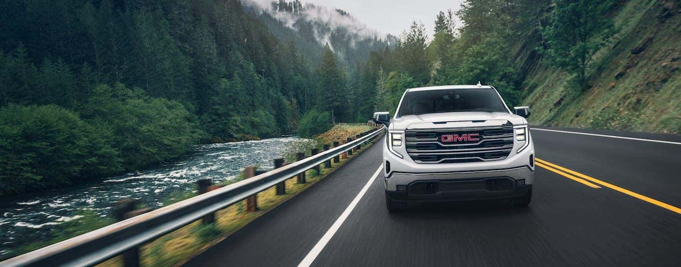 A white 2024 GMC Sierra 1500 from the front.