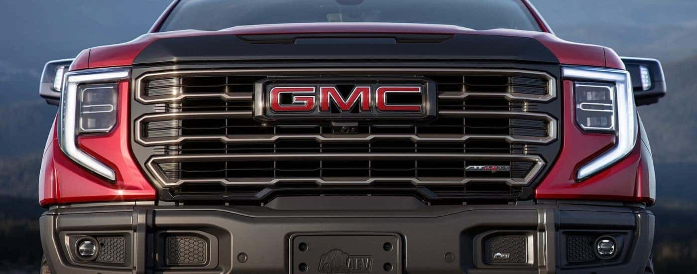 Grille on a red 2026 GMC Sierra 1500 AT4X