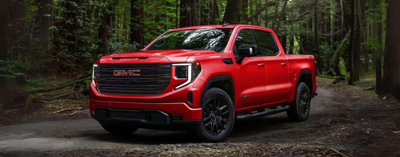 Red 2026 GMC Sierra 1500 for sale near Clemmons parked off-road.