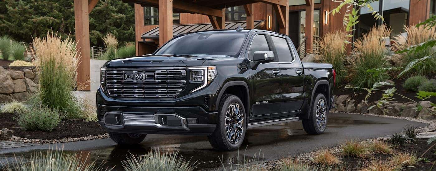 Black 2026 GMC Sierra 1500 for sale near Thomasville parked on a driveway.