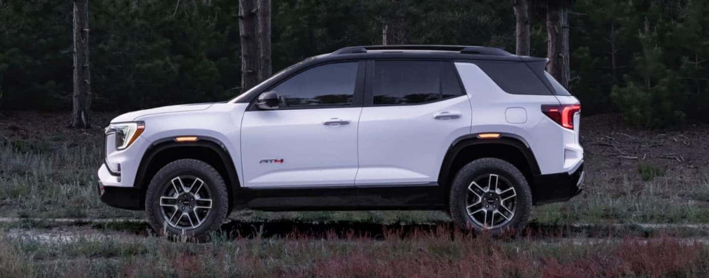 A white 2026 GMC Terrain AT4 parked off-road