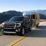 Black 2021 GMC Yukon towing an Airstream trailer