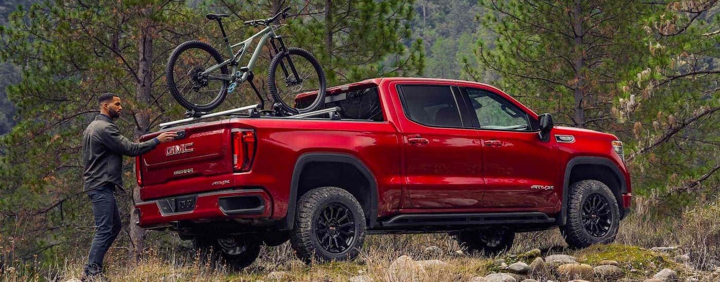 Red 2023 GMC Sierra 1500 AT4X from the rear